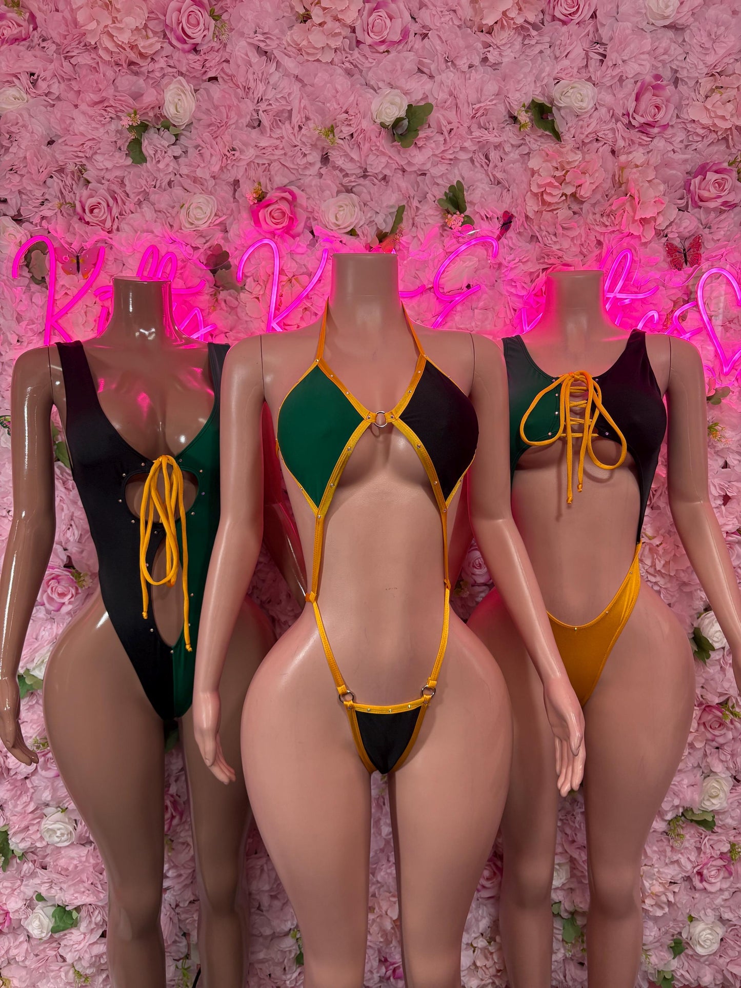 Jamaica flag swimsuit set with three one-piece designs in dark green and gold