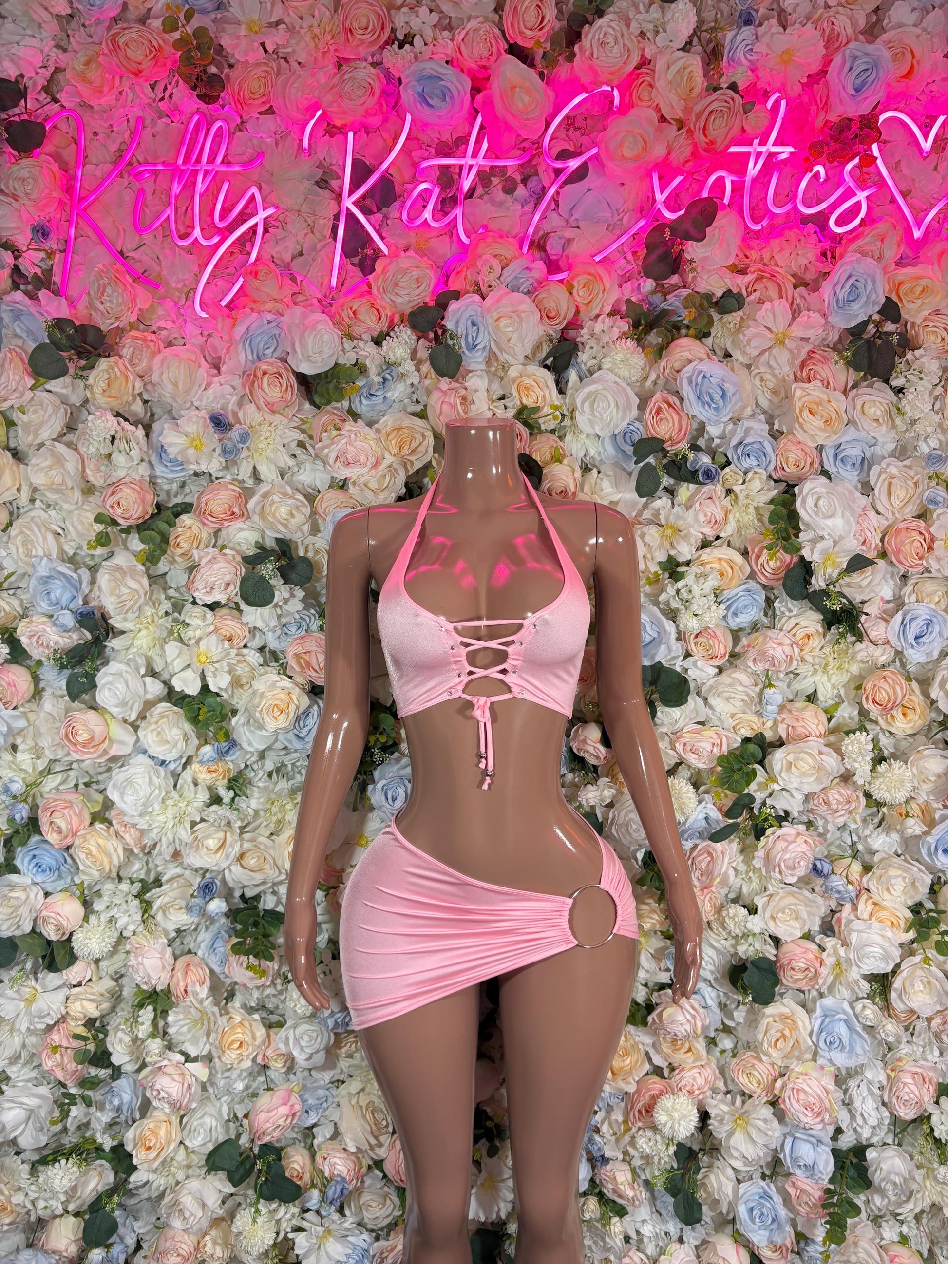 Pink halter mini skirt set with lace-up front and tied straps