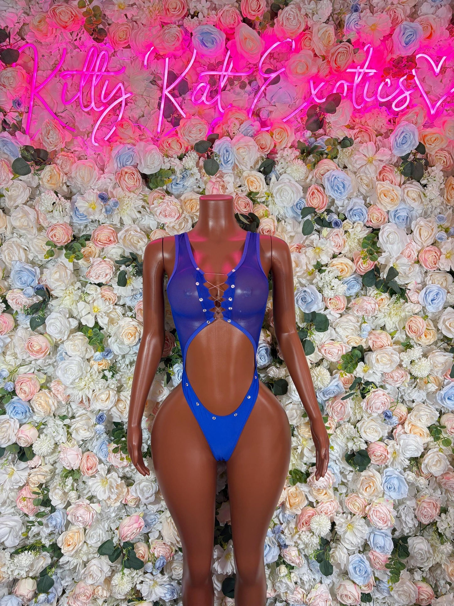 Blue one-piece bodysuit with thin straps and deep V neckline