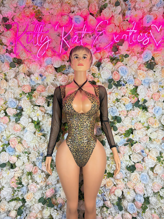 Gold cheetah-print bodysuit with sheer black sleeves and plunging front neckline