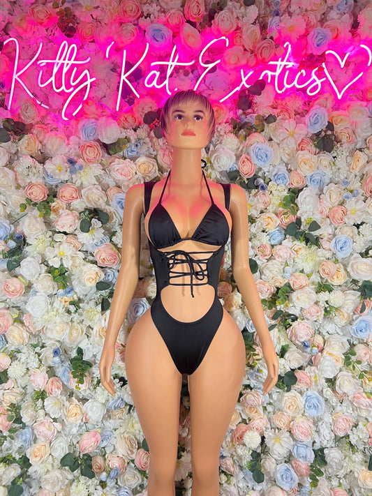 Black lace-up bodysuit with triangle cups and open midsection cutout