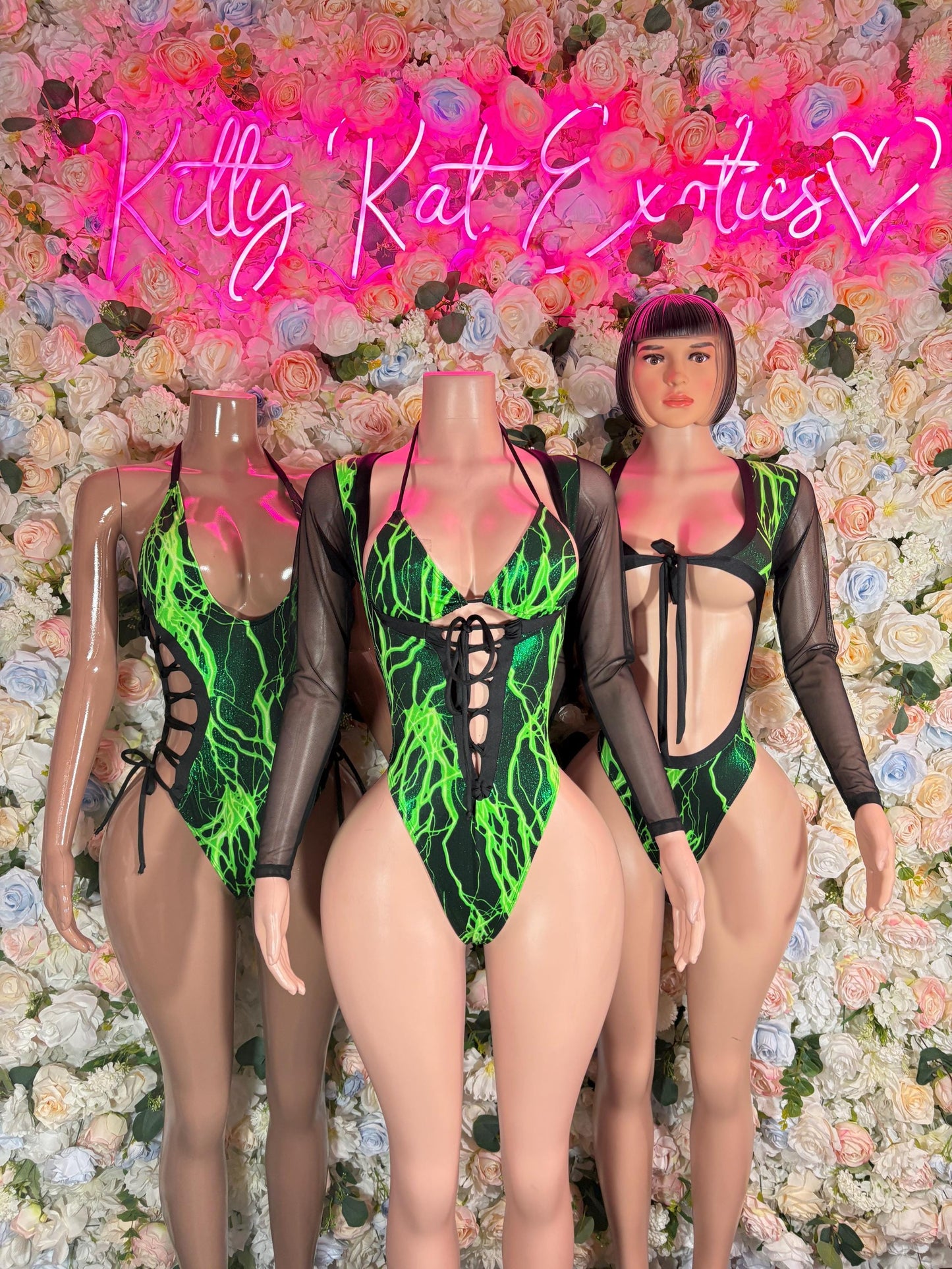 Black long-sleeve sheer one-piece bodysuit with neon green electric lightning front
