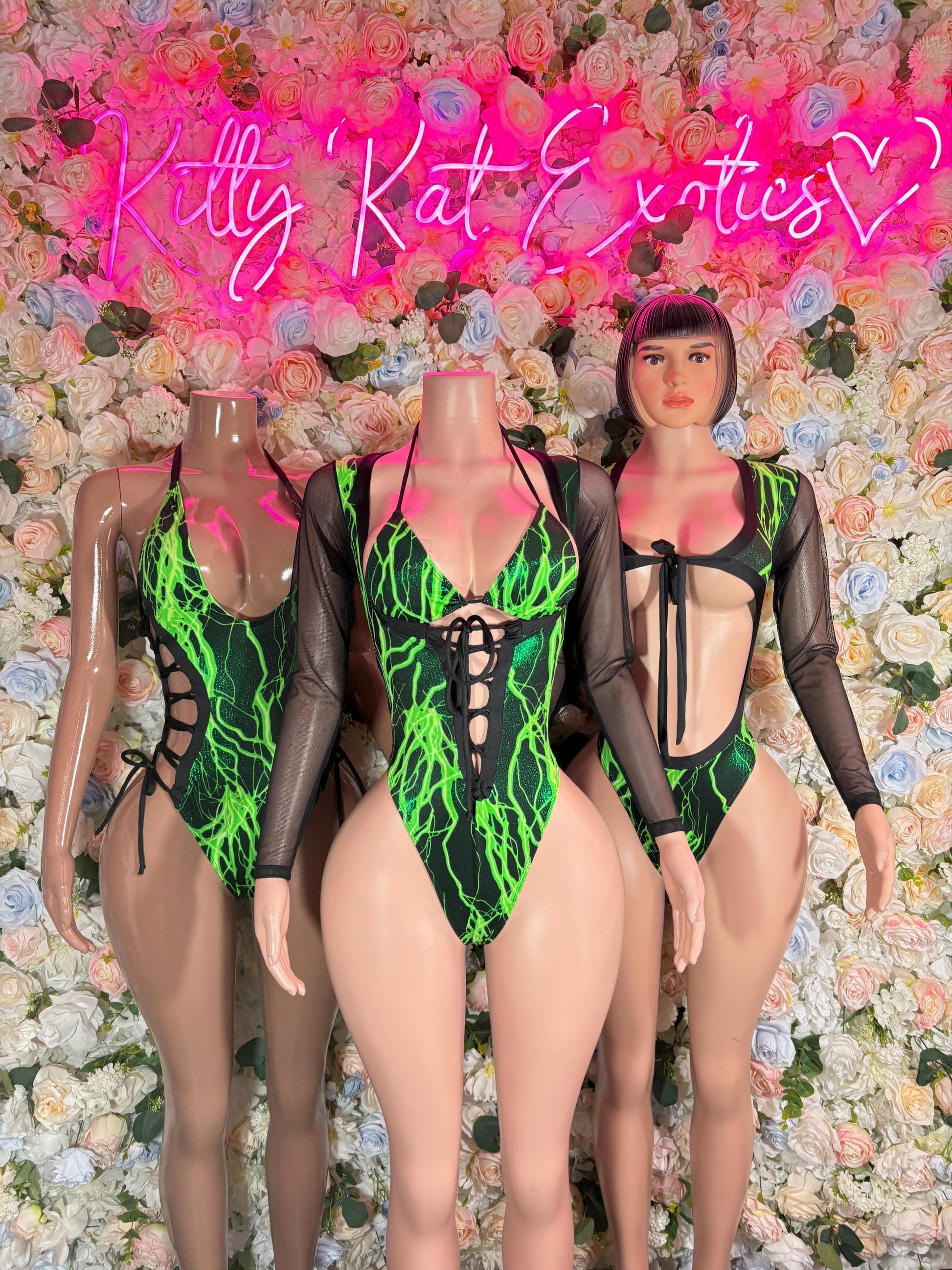 Black long-sleeve sheer one-piece bodysuit with neon green electric lightning front