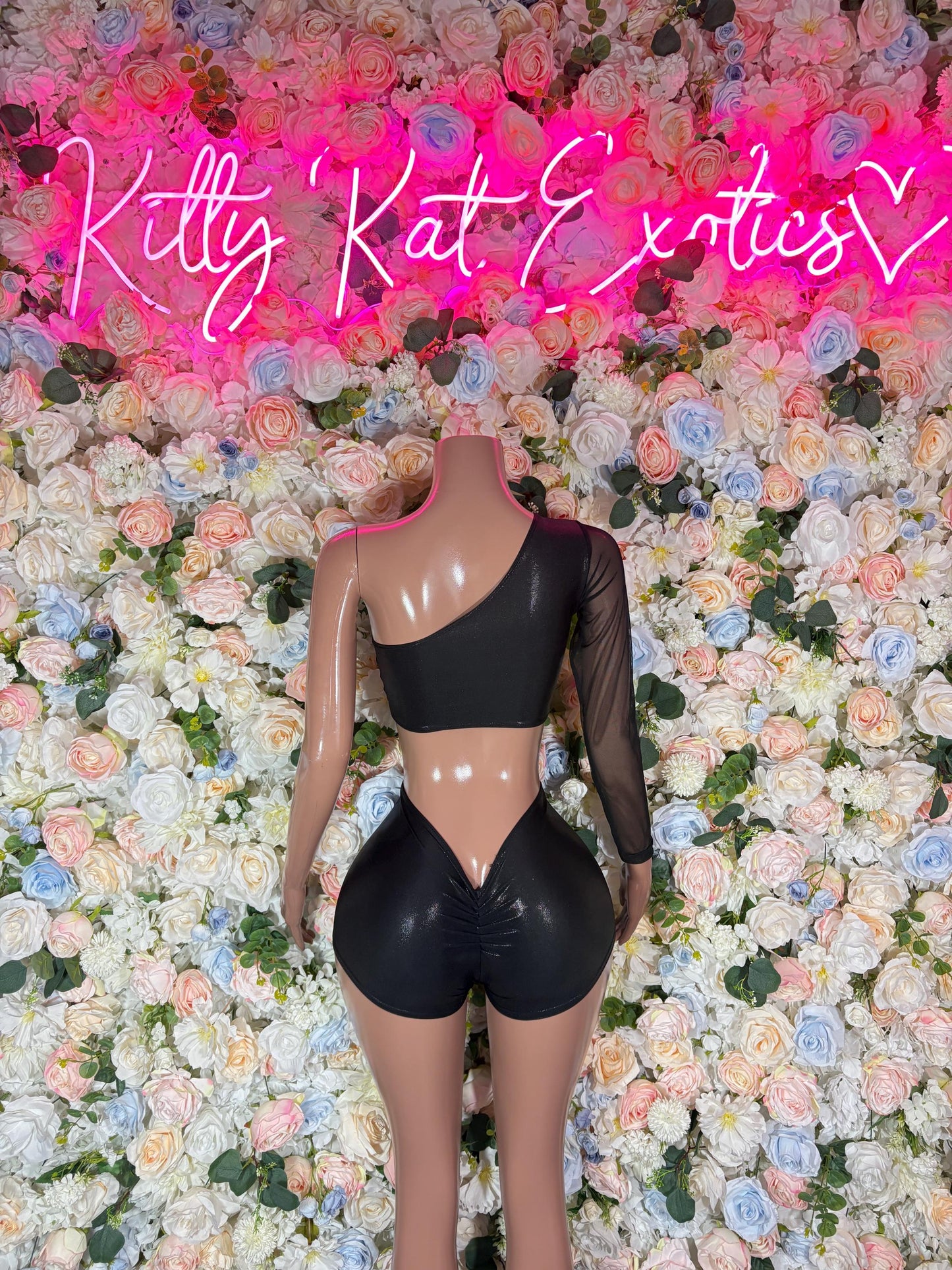 Black long-sleeve cropped top and matching high-cut short set