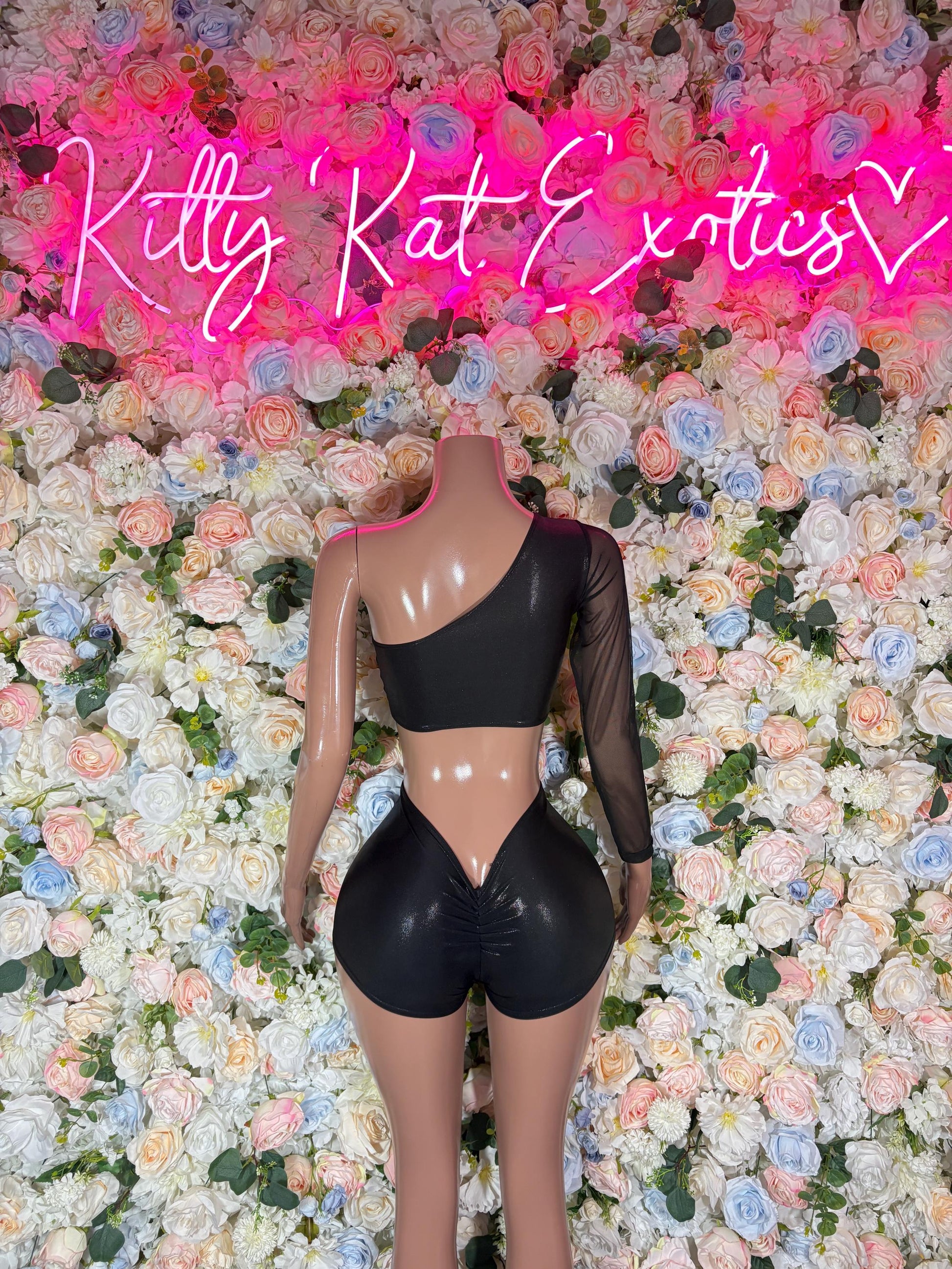 Black long-sleeve cropped top and matching high-cut short set