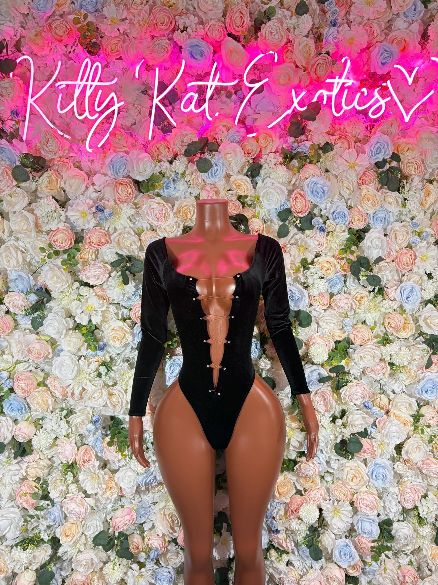 Women's black long-sleeve bodysuit with sweetheart neckline and corset-style front