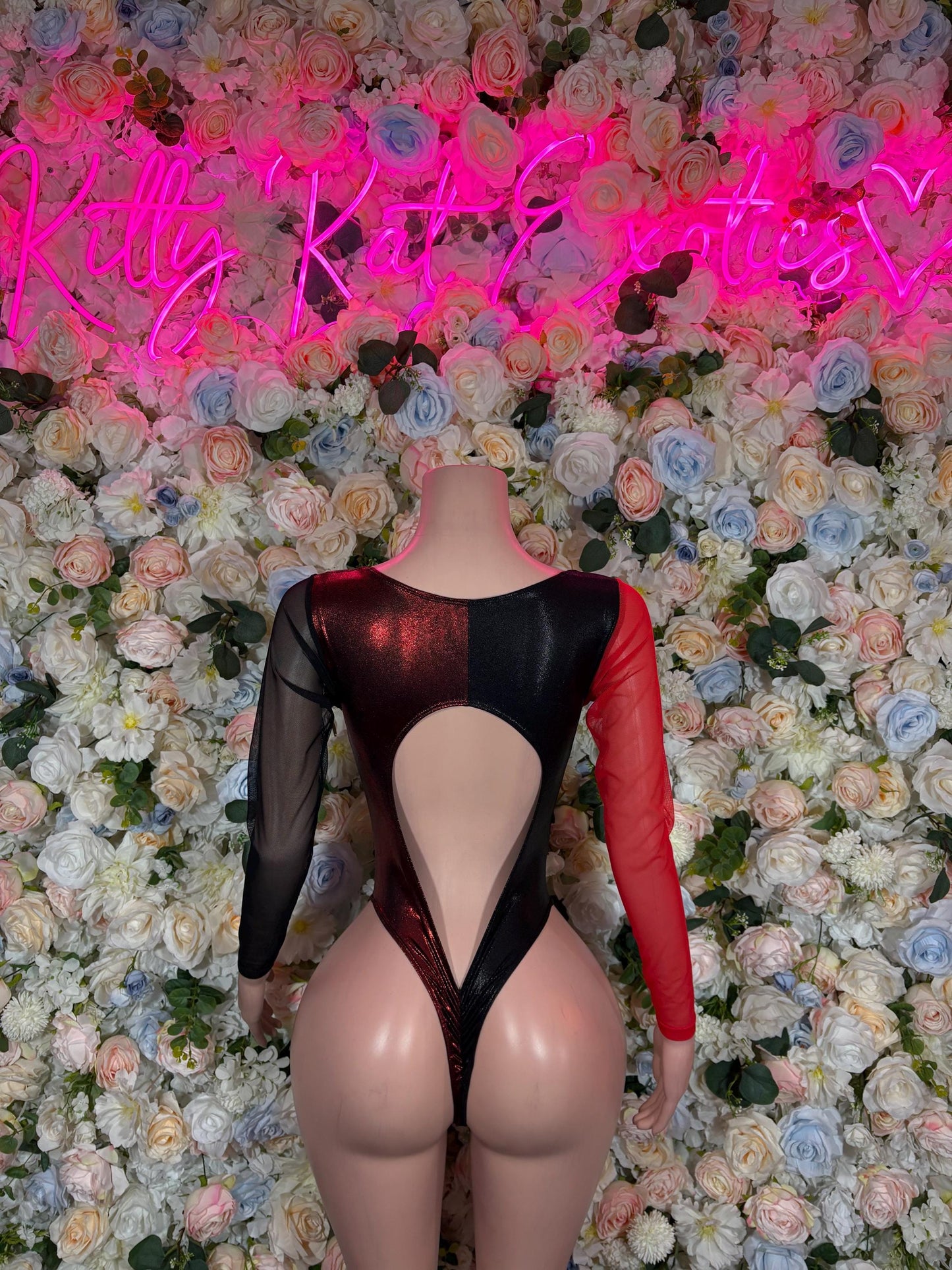 Black and red long-sleeve bodysuit with V back cutout and lace-up neckline