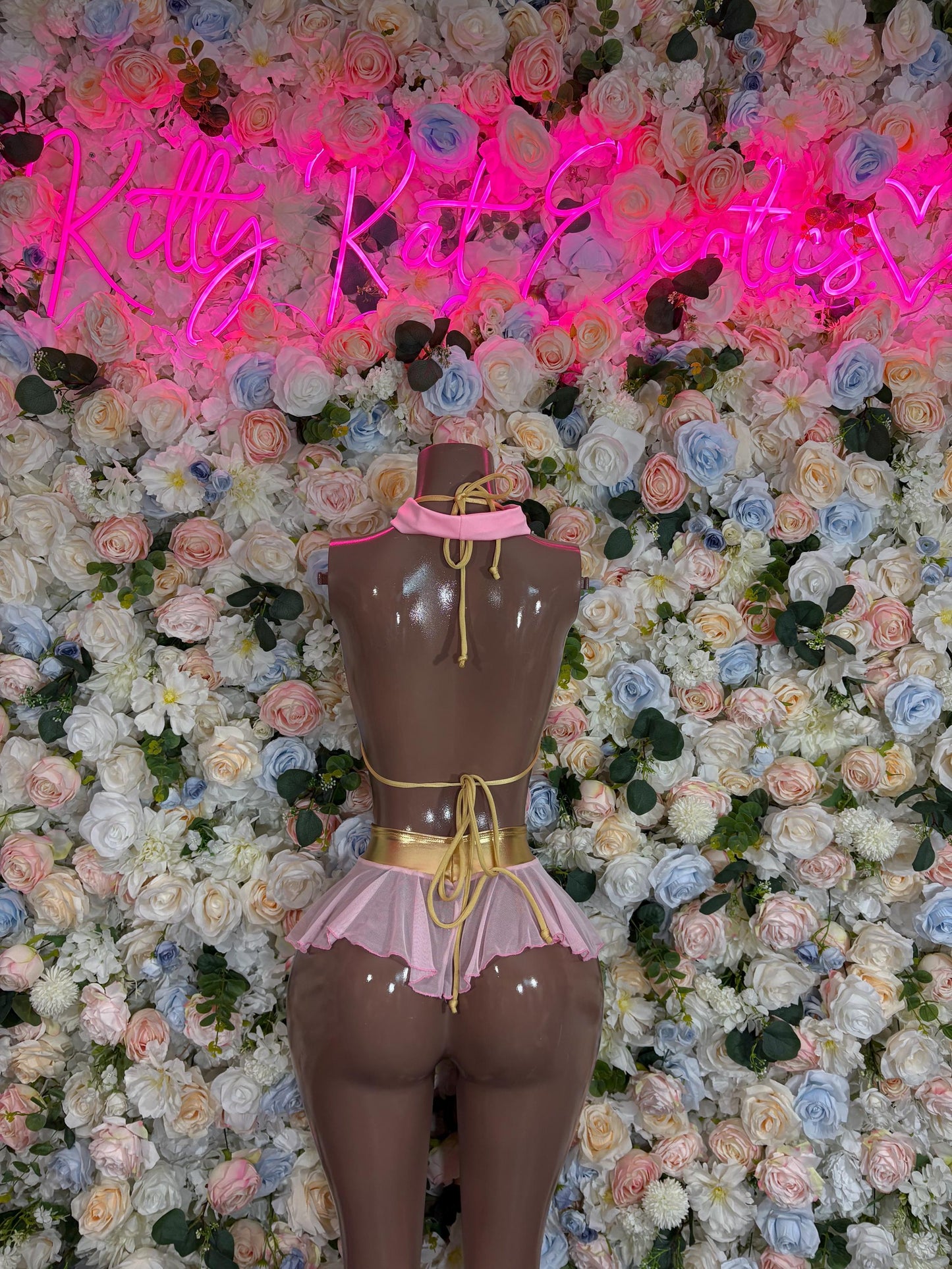 Gold-trimmed bodice with pink ruffled skirt and chain belt accessory set