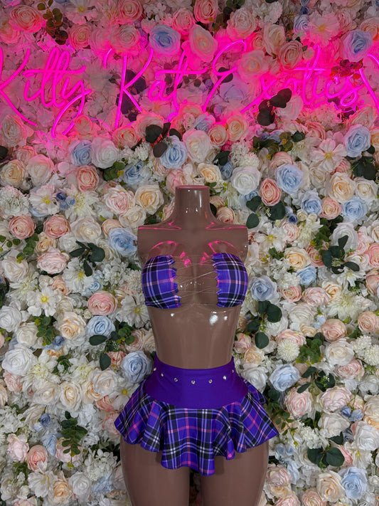 Purple plaid two-piece skirt set with matching top, on mannequin