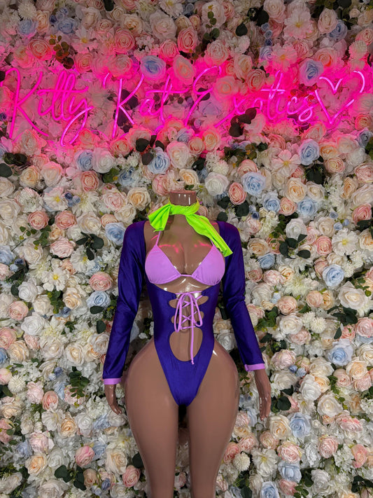 Royal blue Halloween bodysuit with neon green bow, long sleeves, lace-up front