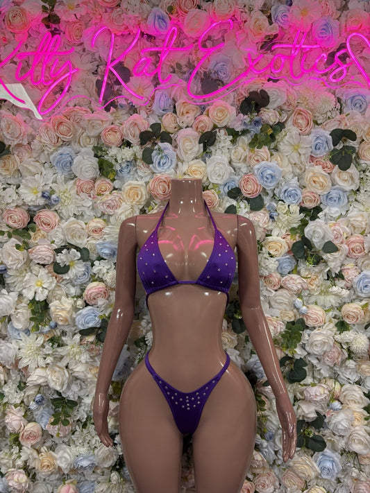 Purple triangle shimmer bikini set on model, front view with tied string bikini bottom