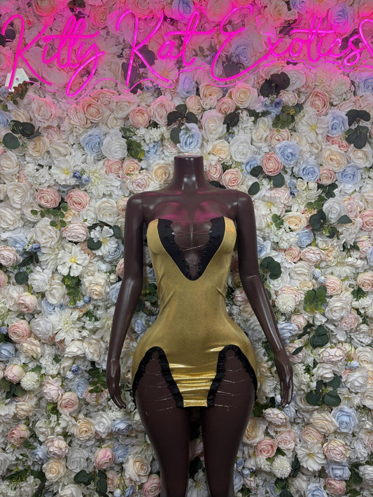 Metallic gold mini dress with black cutout panels and sweetheart neckline