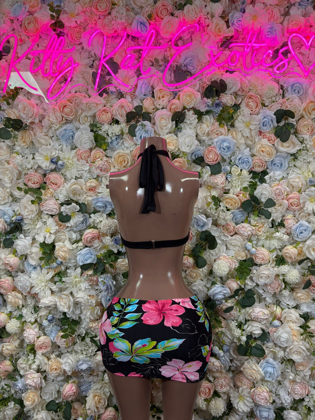 Black base floral two-piece: keyhole mini skirt with matching bra-style top