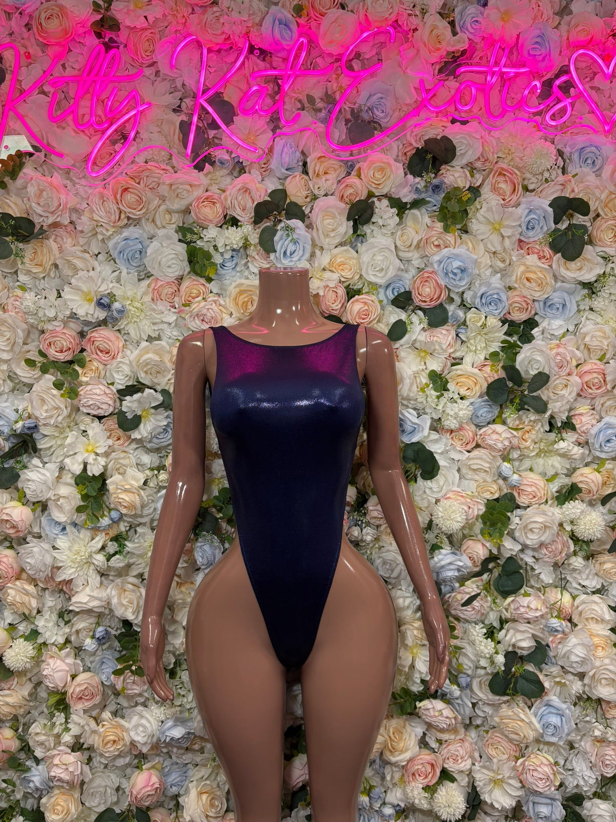 Navy high-neck bodysuit with blue contrast trim, sleeveless thong fit