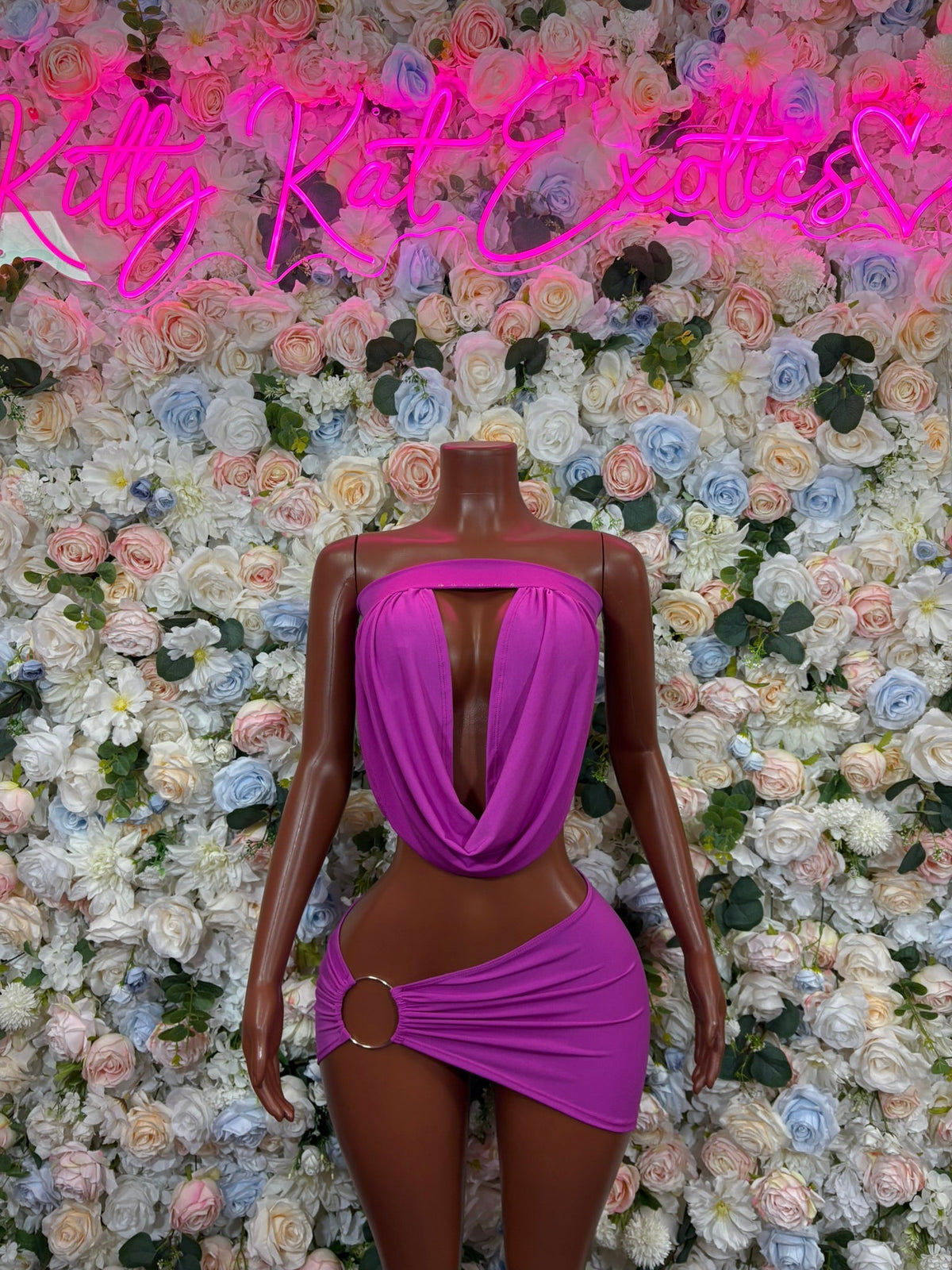 Purple draped halter top and wrap mini skirt set with long back cutout
