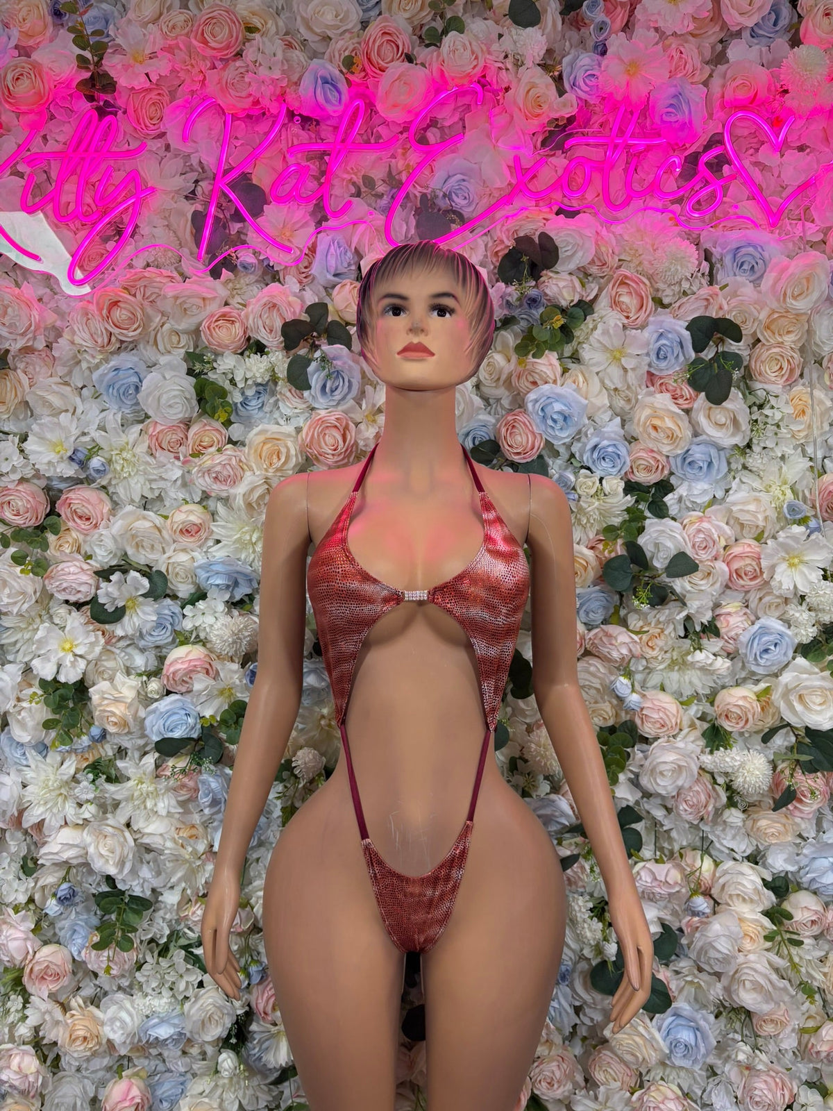 Red patterned halter bodysuit with thin straps and thong bottom