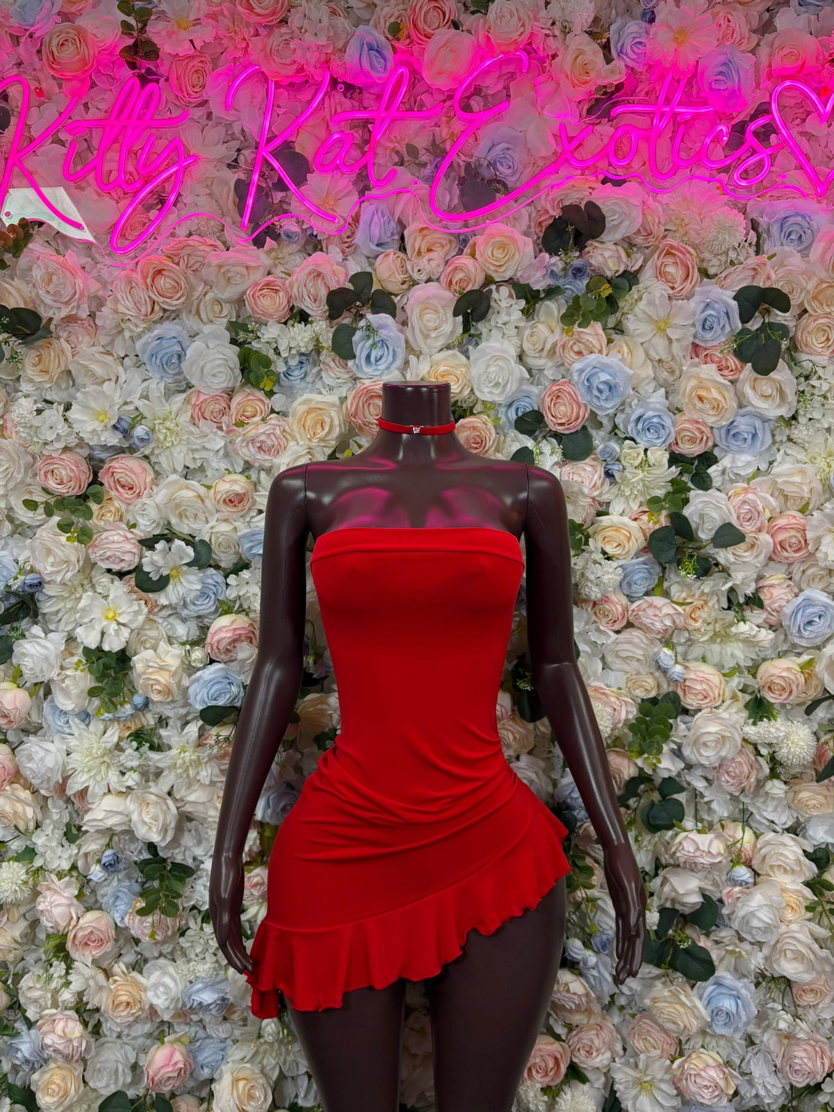 Red high-neck asymmetric mini dress with draped ruched bodice and ruffled hem