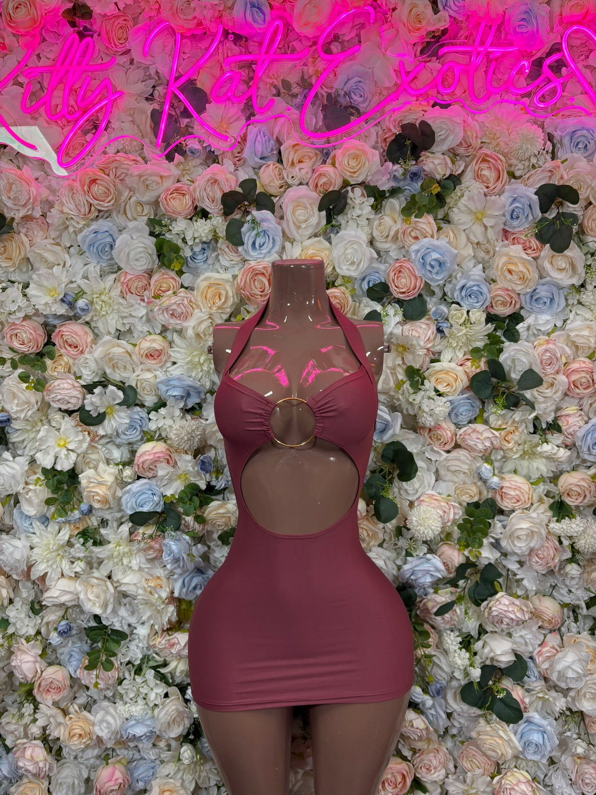 Mauve keyhole halter mini dress on mannequin, front ring and keyhole cutout