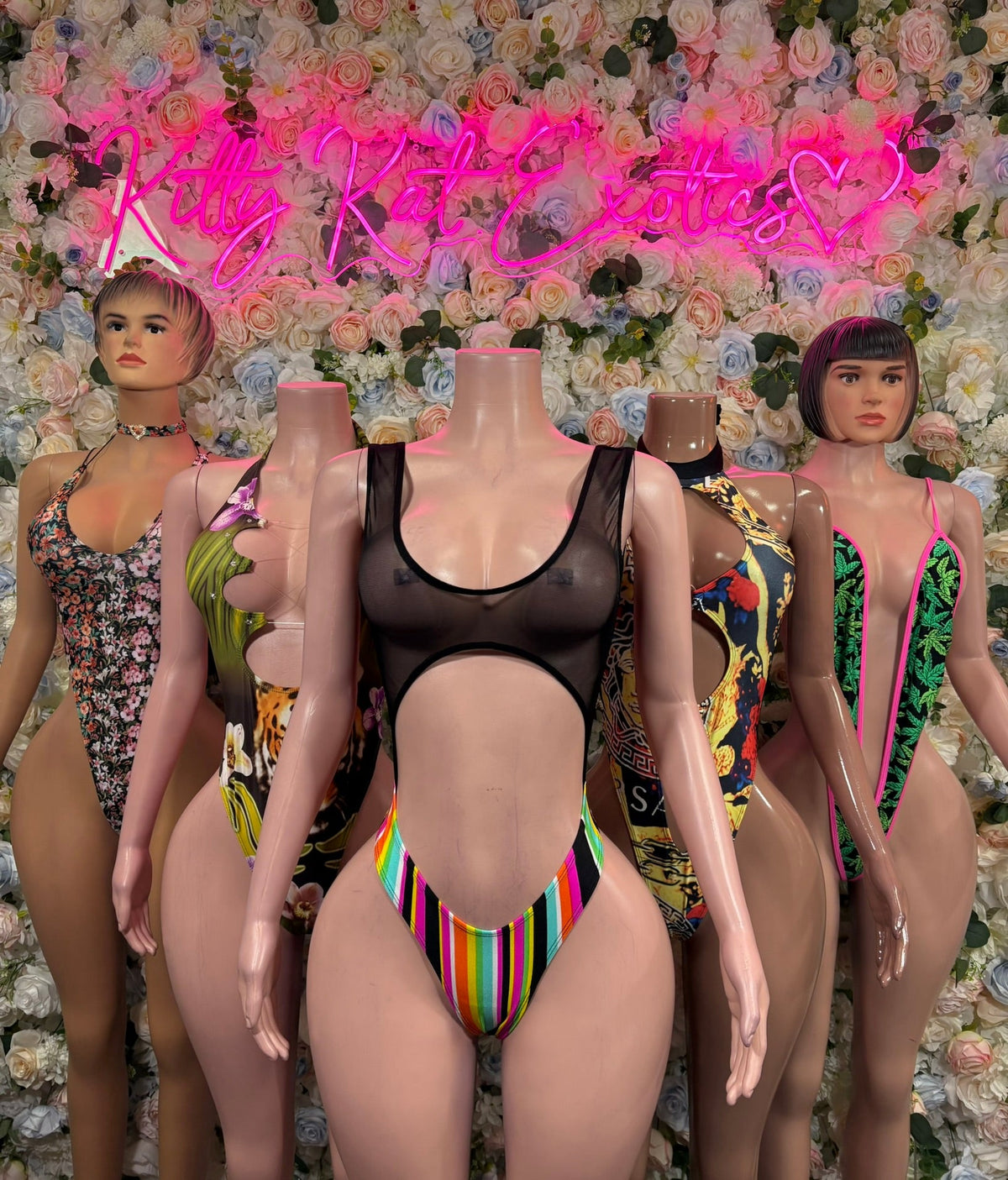 Black high-neck cutout bodysuit with rainbow striped center panel