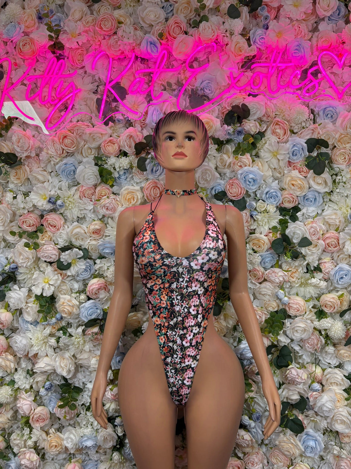 Multicolor floral halter bodysuit with high-cut leg openings