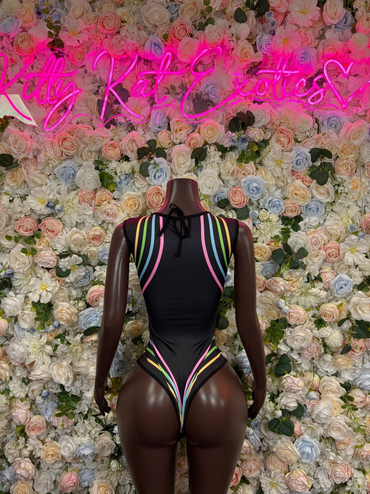 Black high-neck bodysuit with multicolor striped trim and deep V front