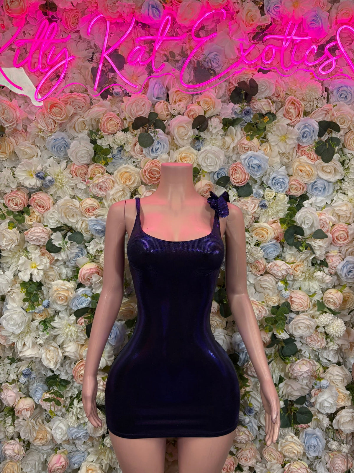 One-shoulder velvet mini dress in dark black, front view with fitted silhouette