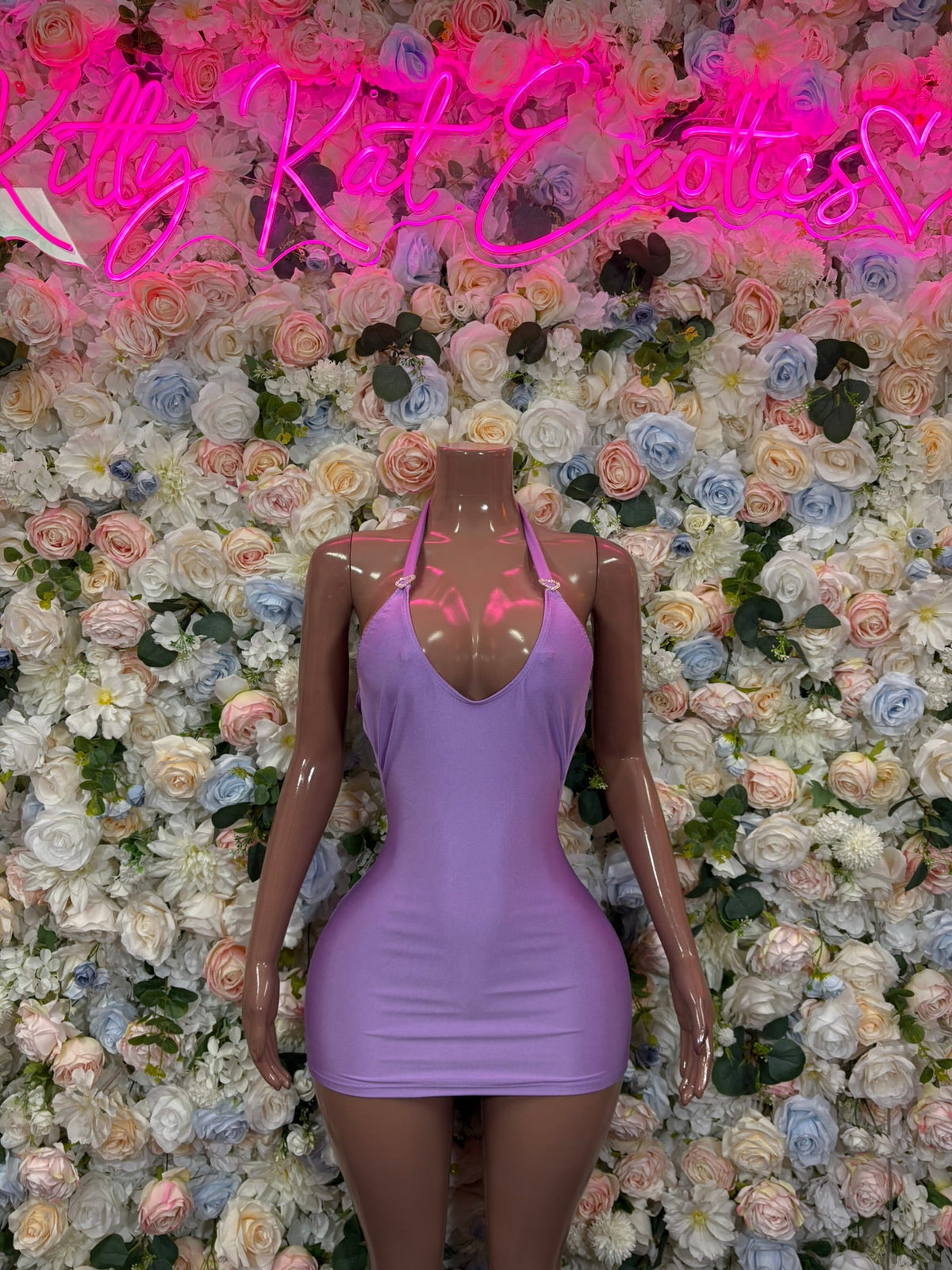 Lavender bodycon mini dress with V-neck front and open-back tie straps