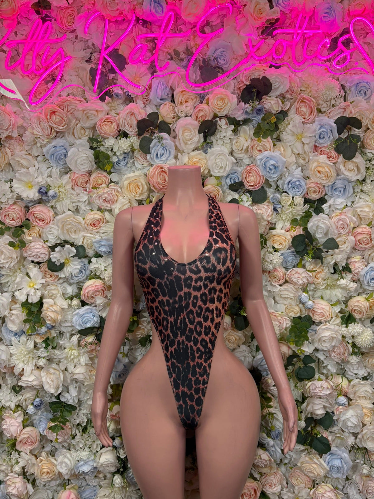 Leopard print slingshot bodysuit with scoop front and high-cut one-piece