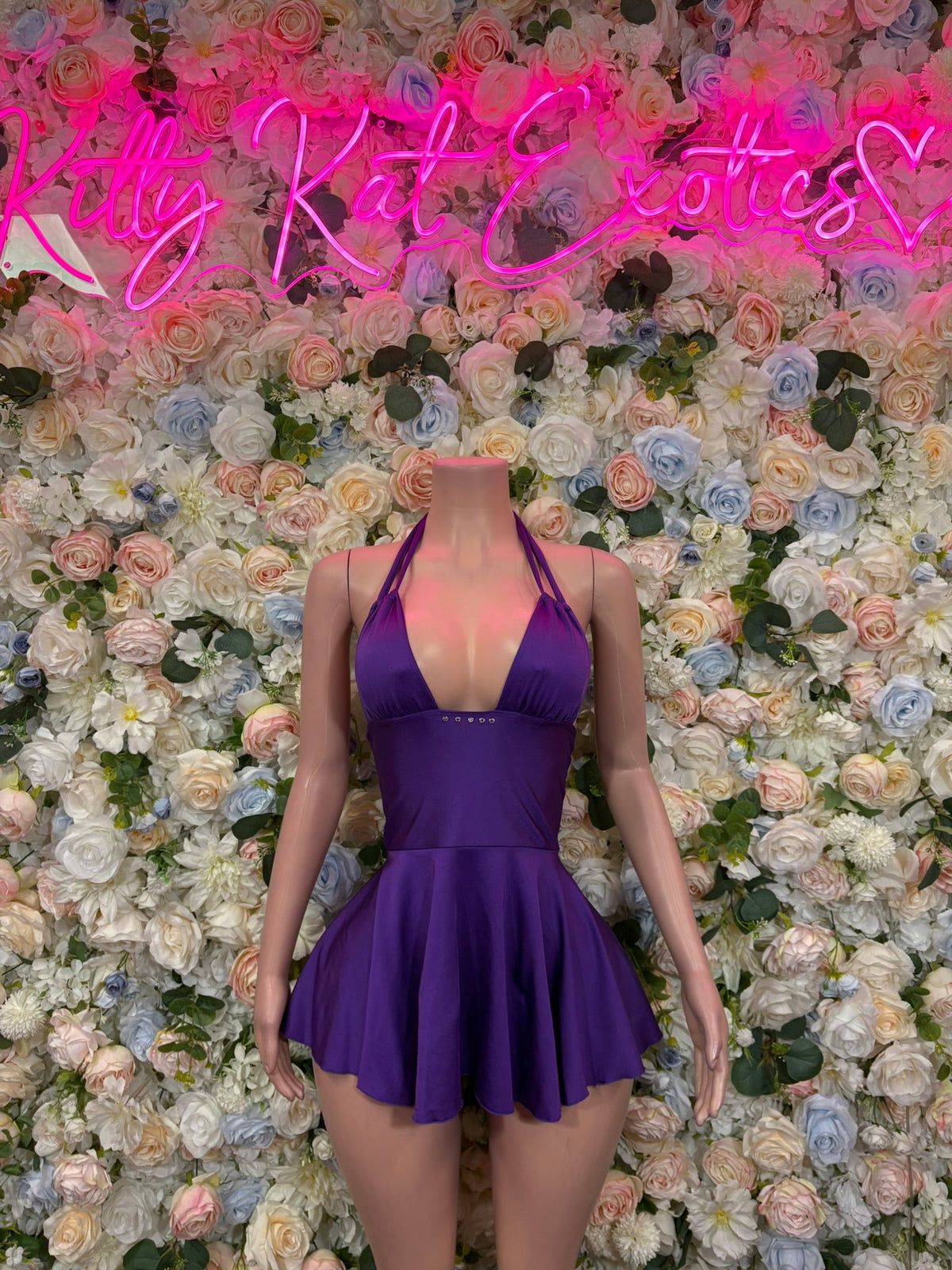 Purple halter mini dress with V-neck bodice and flared skirt