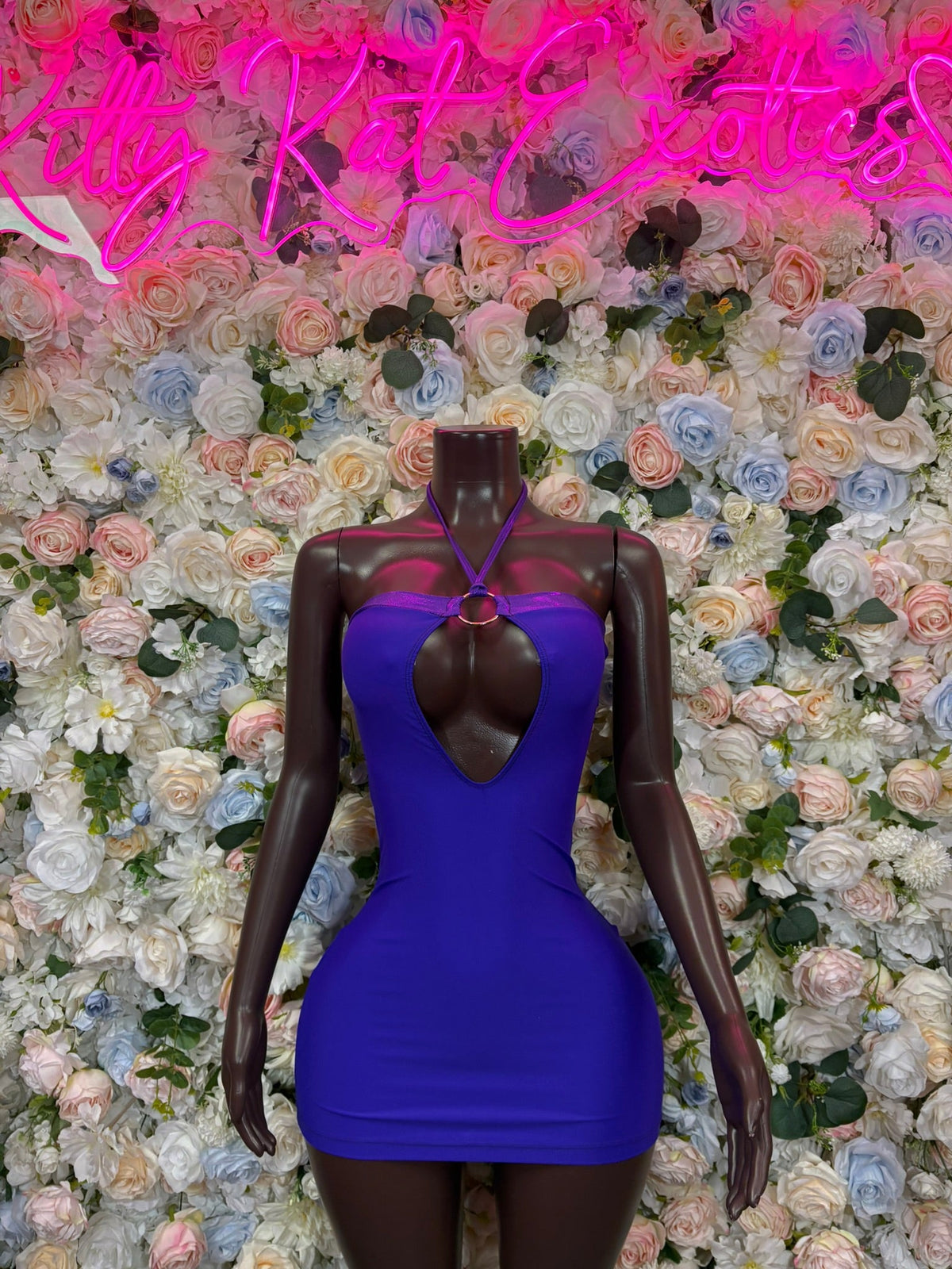 Royal blue mini dress with heart cutout neckline, sleeveless bodycon silhouette