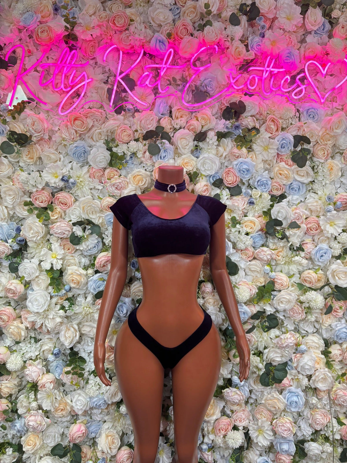 Dark navy cropped tank bikini top and micro bikini bottom, front view on model