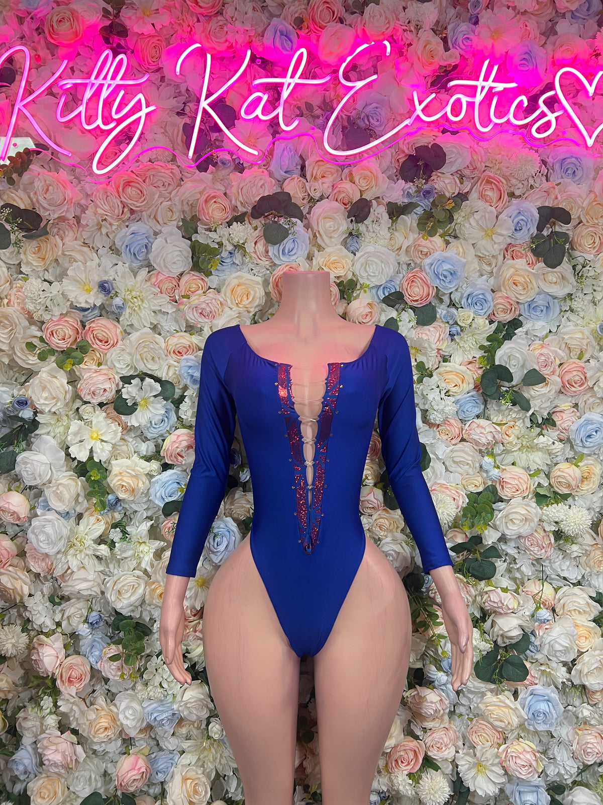 Dark blue long-sleeve high-cut bodysuit with open back and vertical lace-up detail