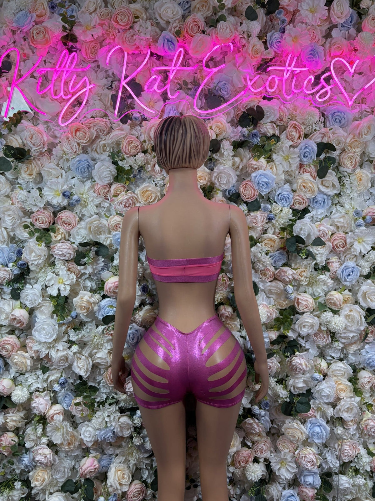 Back-view pink striped crop top and high-rise shorts set