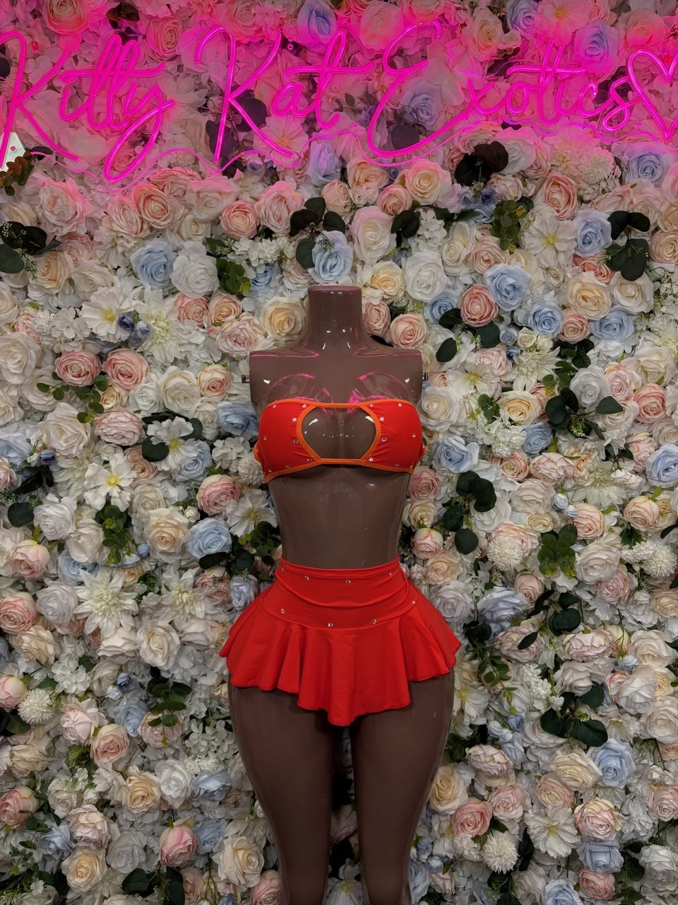 Red halter top with heart-shaped chest detail and ruffle skirt set