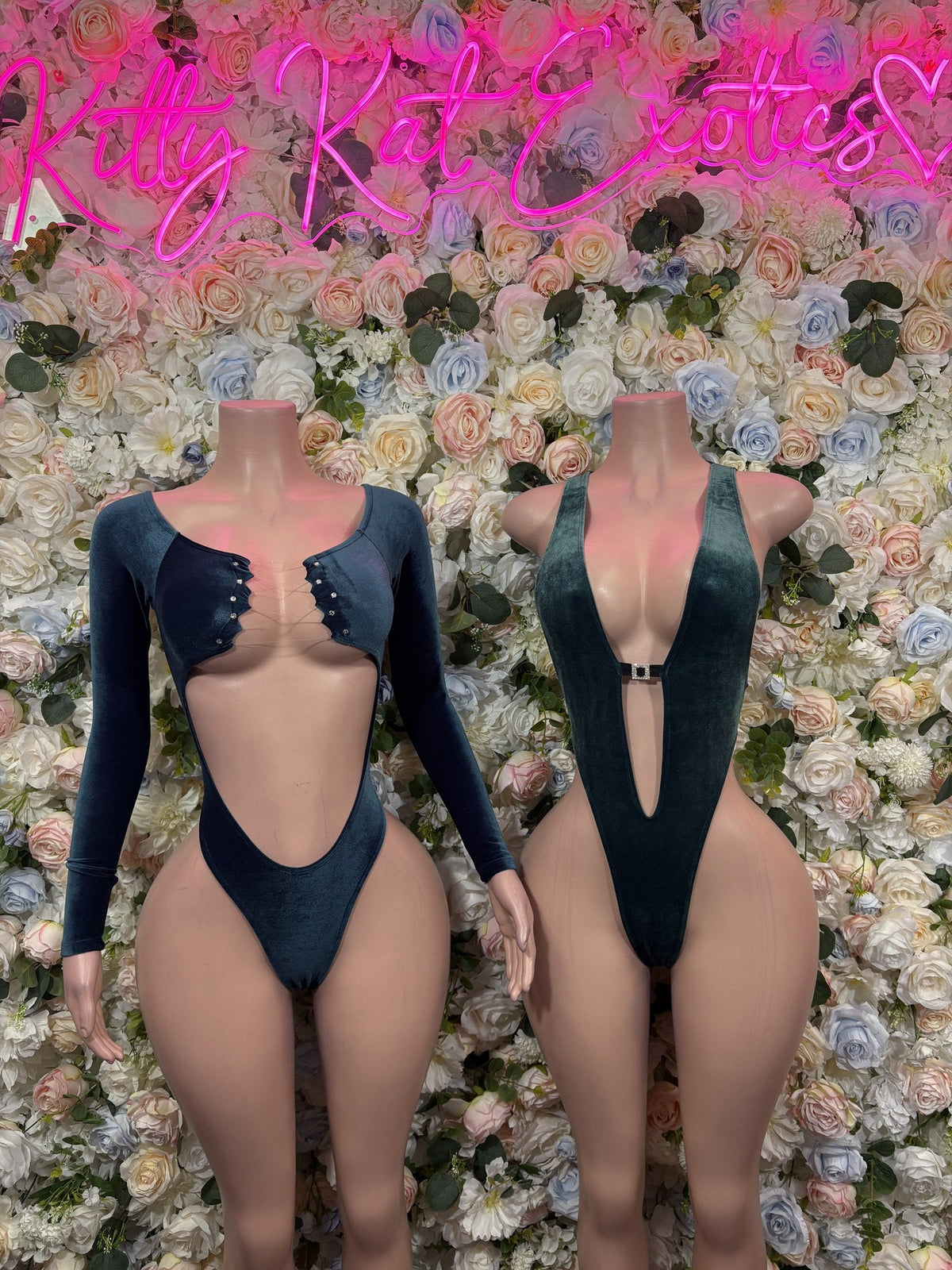 Black halter bodysuit with deep V neckline, front cutout, and center clasp
