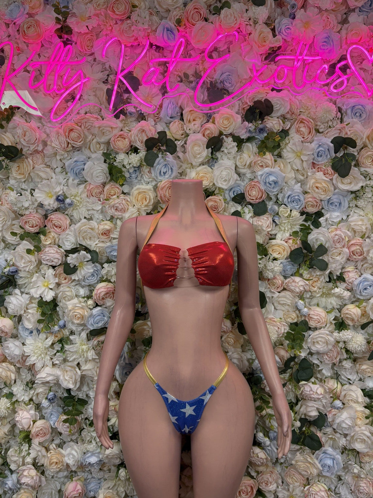 Red halter bikini top with ruched cups and blue star-print bottom