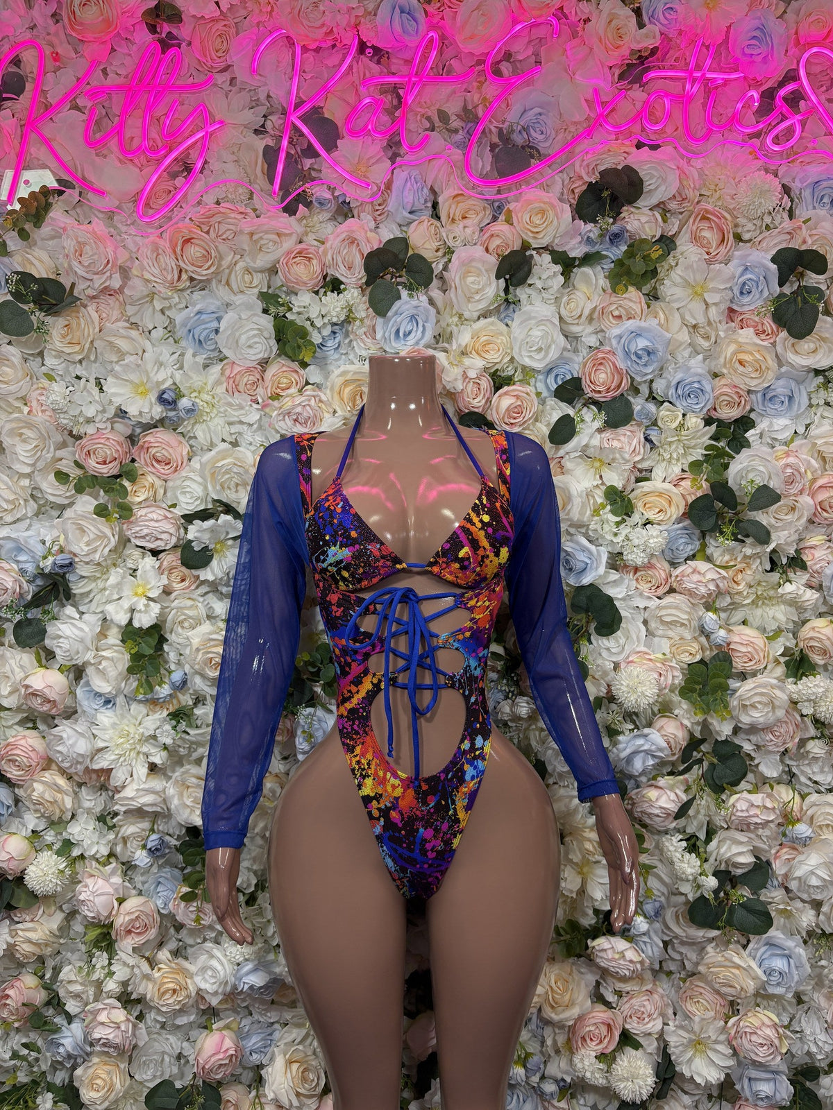 Blue long-sleeve lace-up bodysuit with multicolor front and back cutout