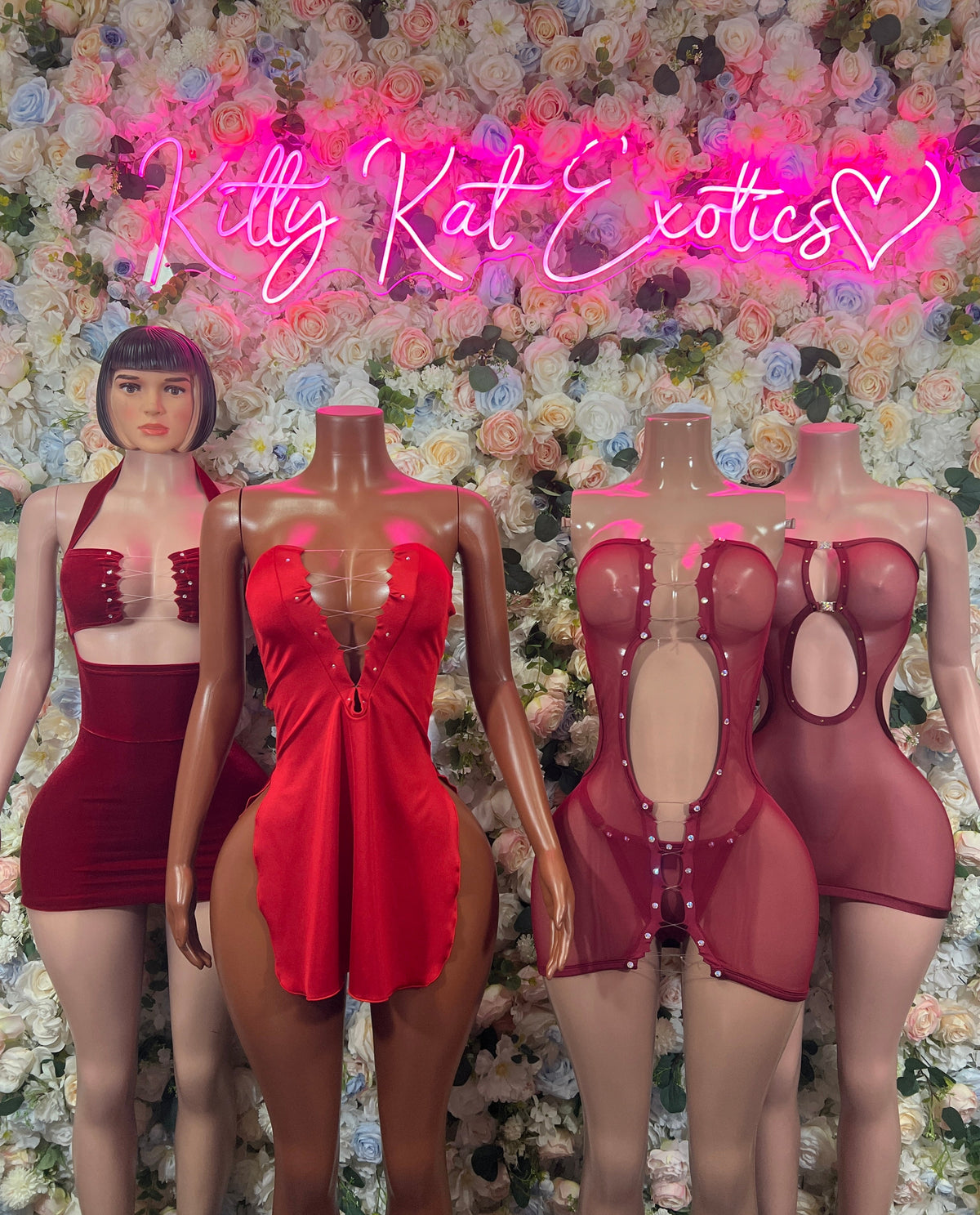Red strapless cutout one-piece bodysuit on mannequins, front and side views