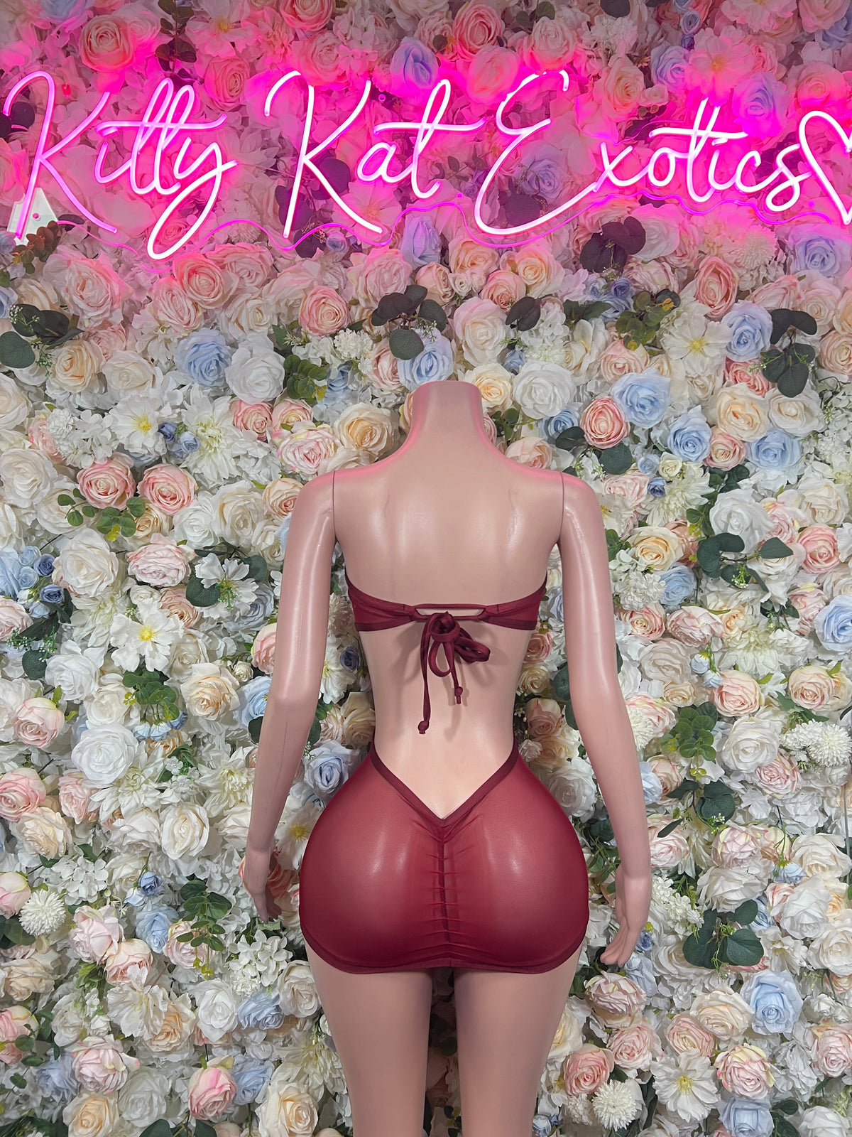 Burgundy cutout mini dress with ribbon bow at back neckline
