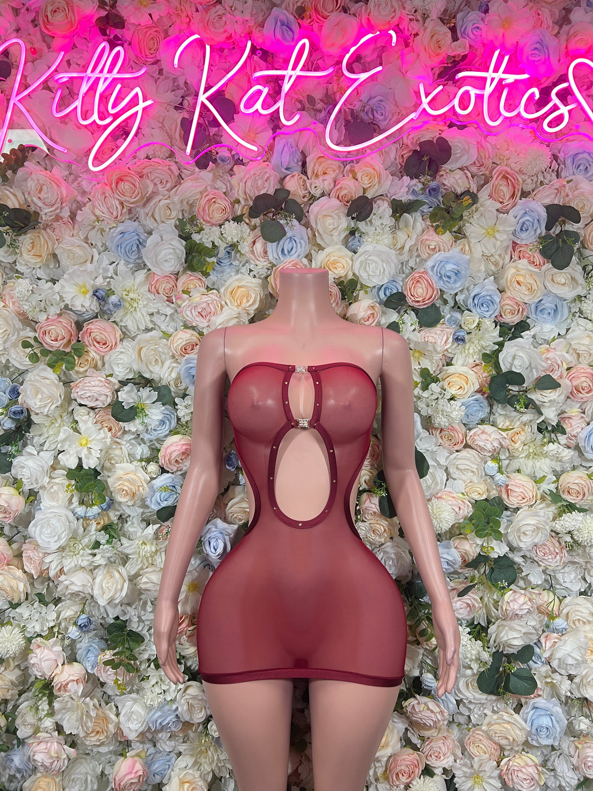 Burgundy strapless mini dress with oval back cutout and vertical straps