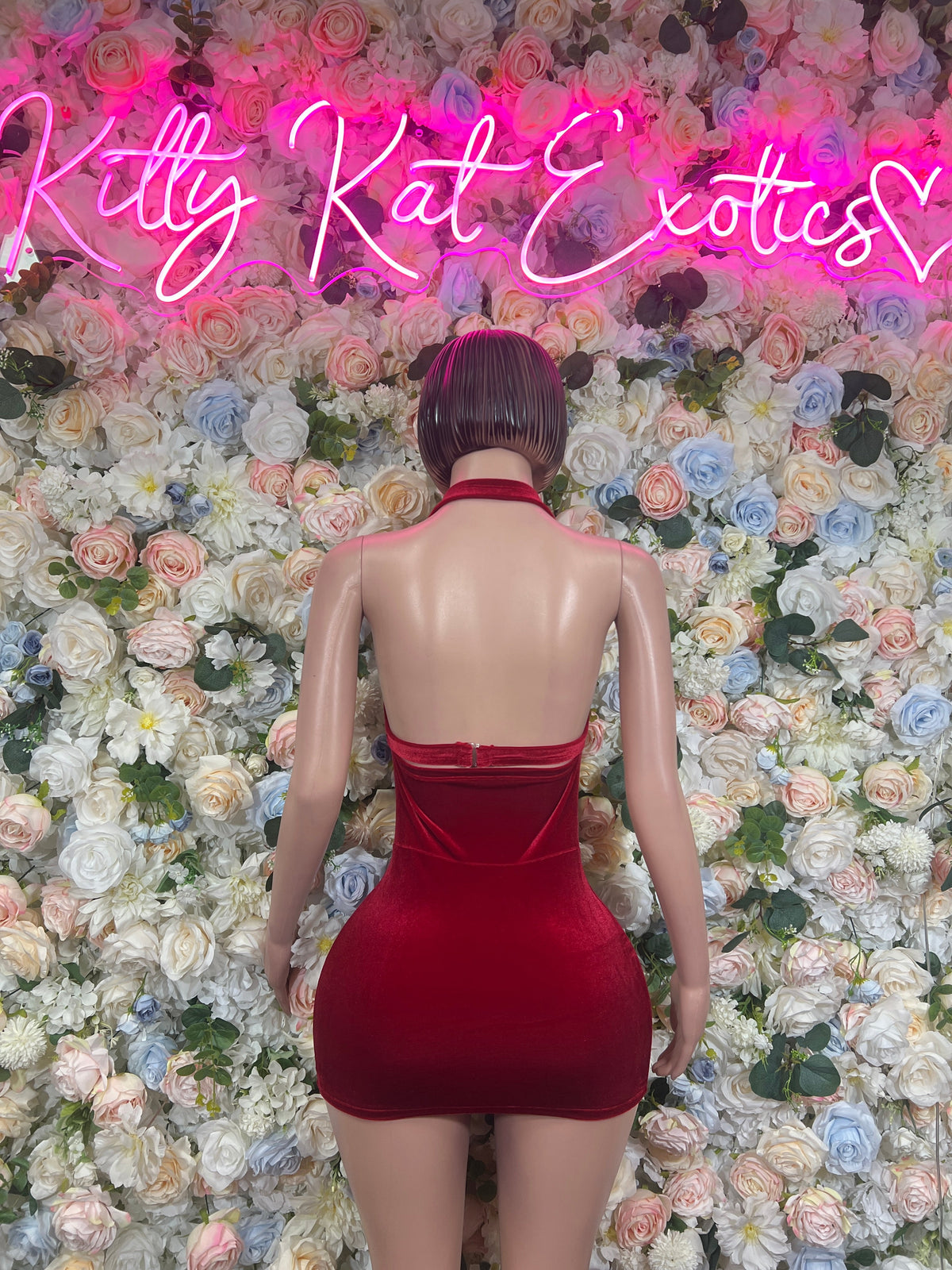 Burgundy backless mini dress with open back and ruched seam details