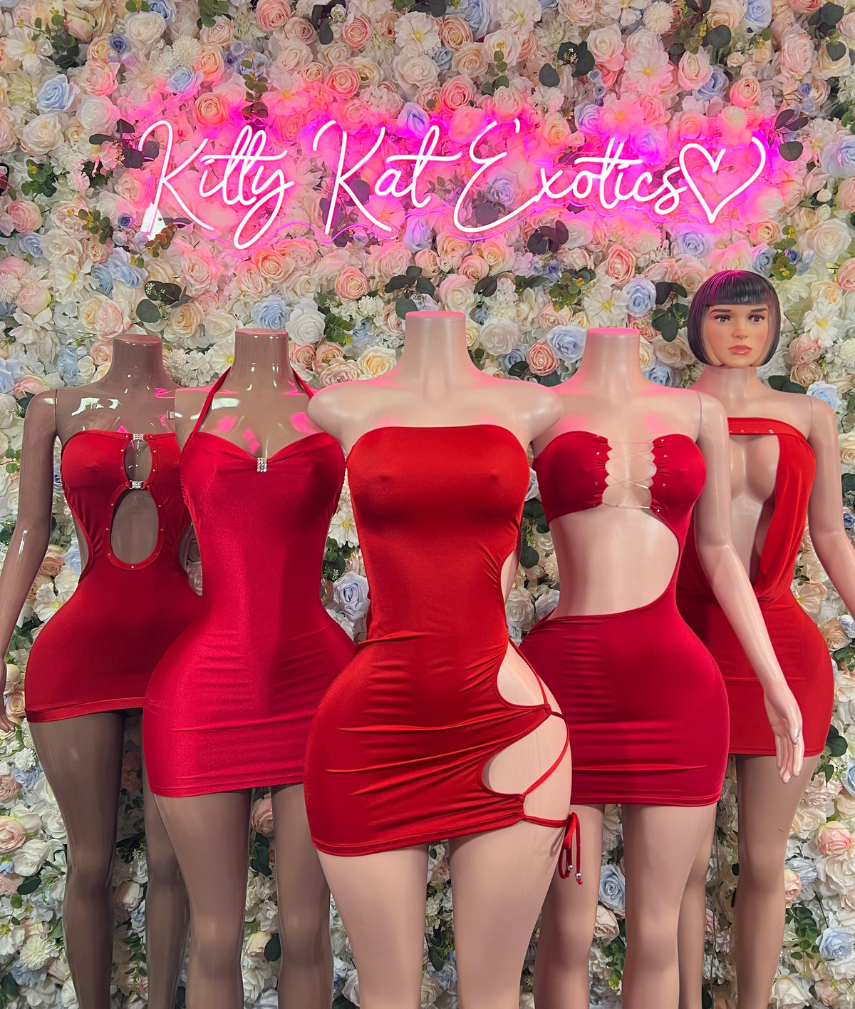Red strapless rhinestone cutout mini dress on mannequins, multiple angles