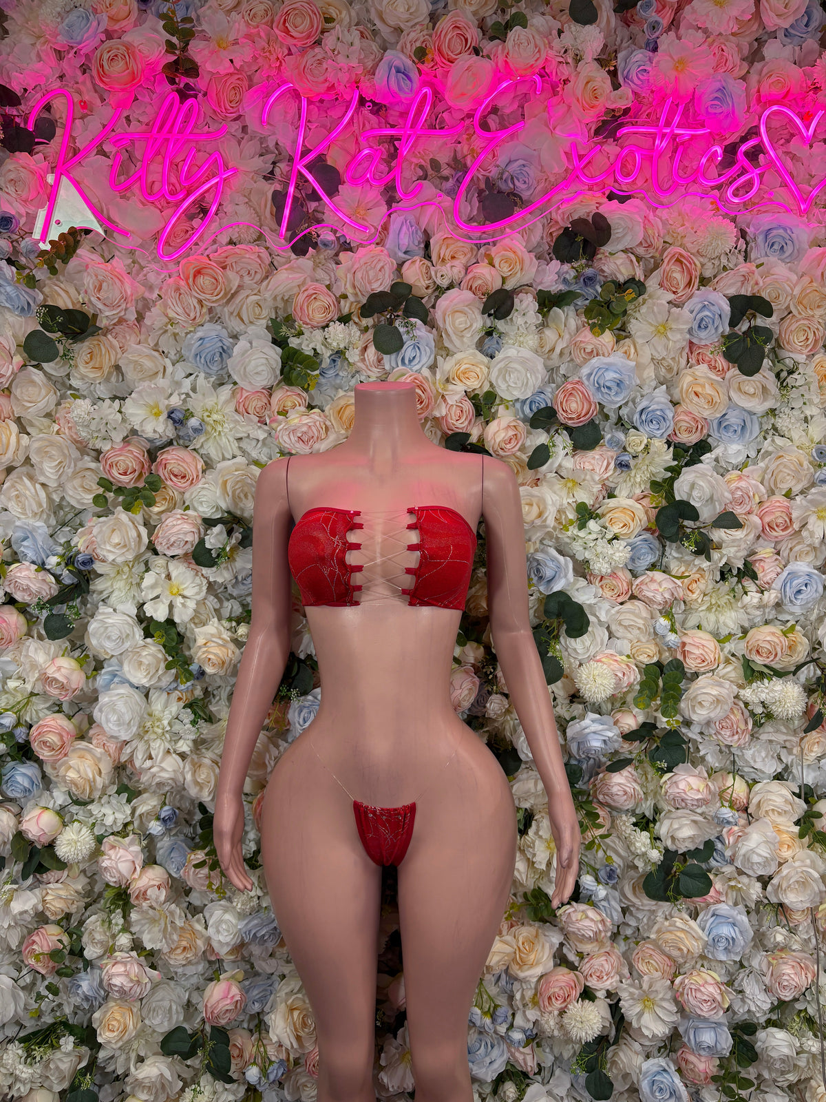 Red bandeau micro bikini set on mannequin, molded bandeau top and high-cut bottoms