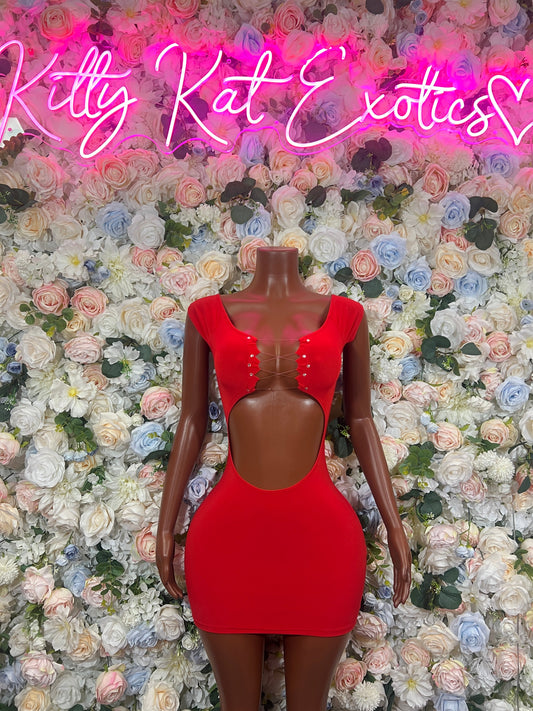 Red mini dress with spaghetti straps and side cutouts, fitted bodycon style