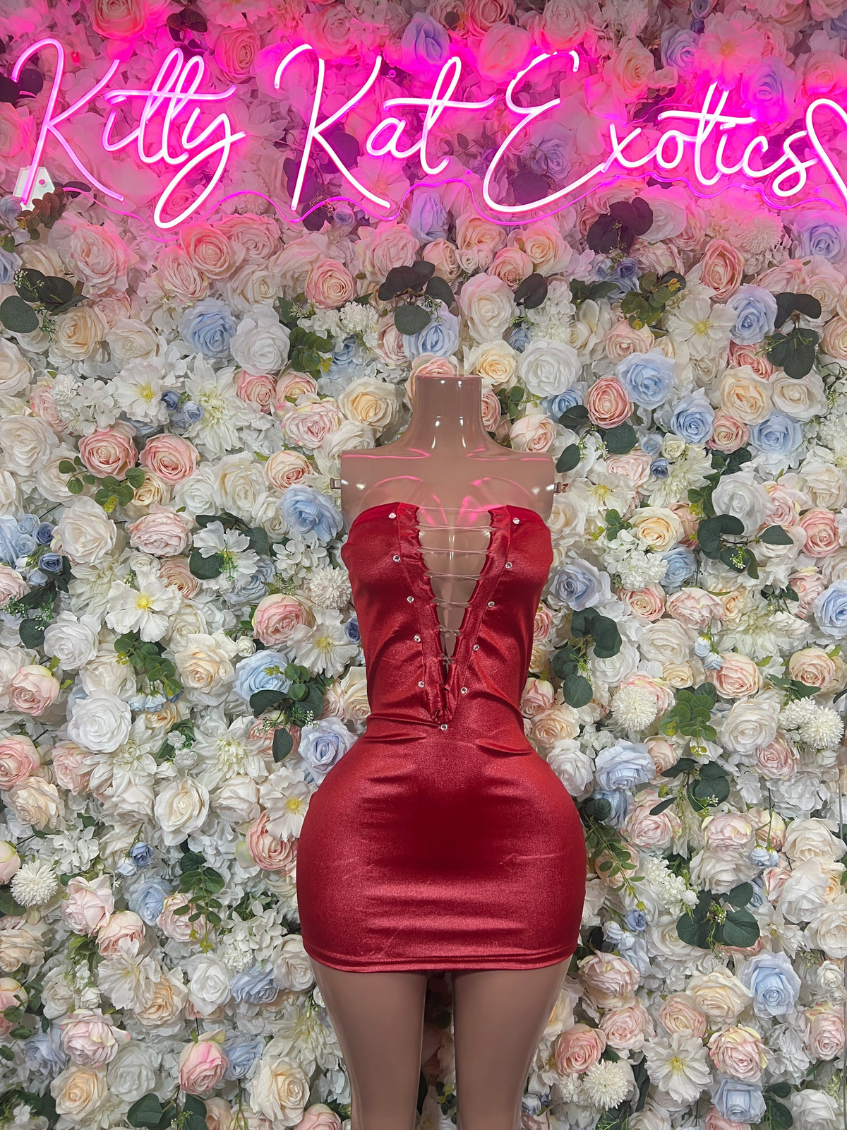 Red lace-up bust mini dress with sweetheart neckline and satin sheen