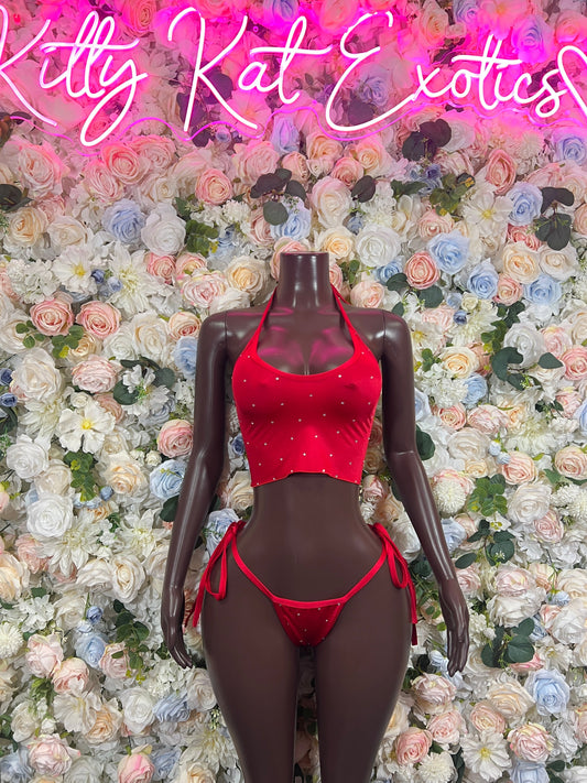 Red rhinestone scoop-neck two-piece set with matching bikini bottoms on mannequin