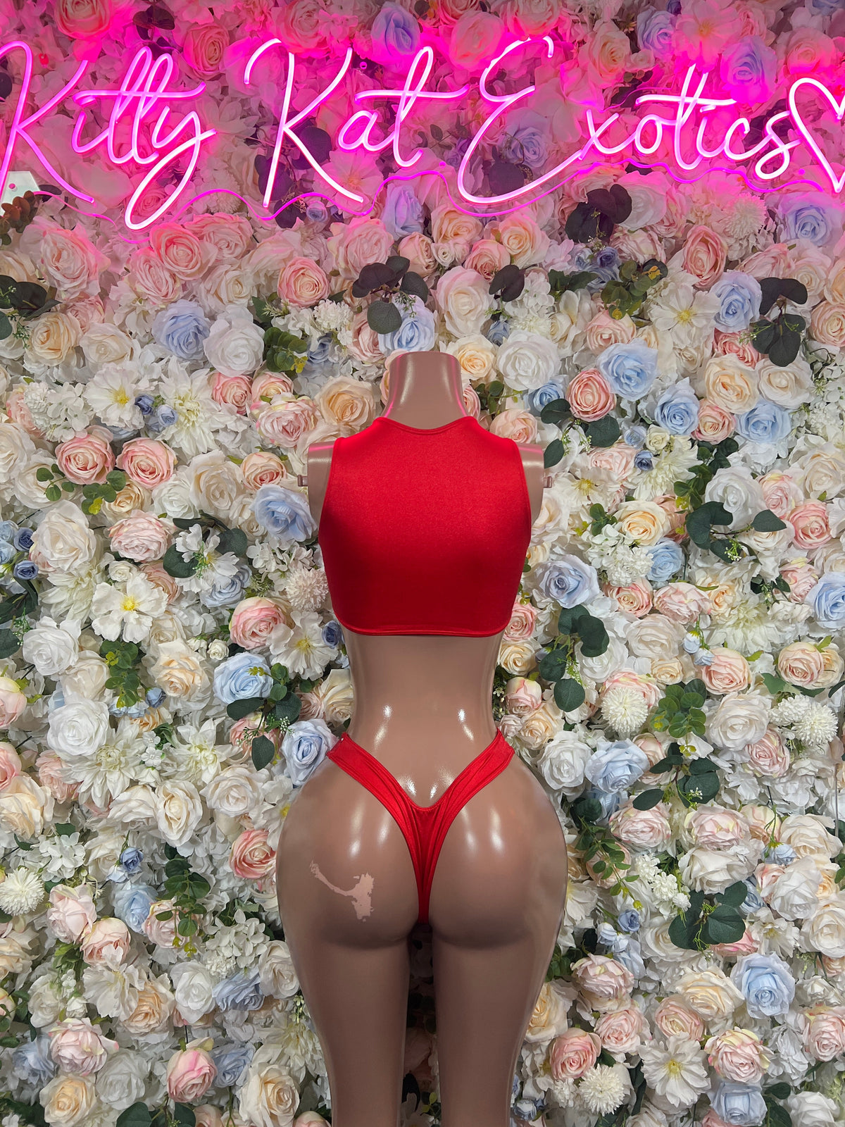 Red high-neck crop top and matching thong bikini bottom with rhinestone accents