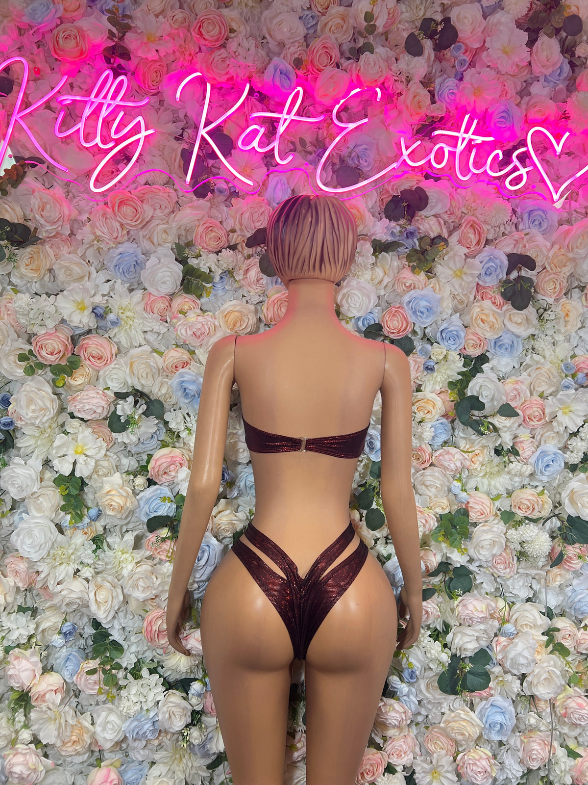 Back view burgundy metallic strappy bikini set: bandeau top and high-cut bottom straps