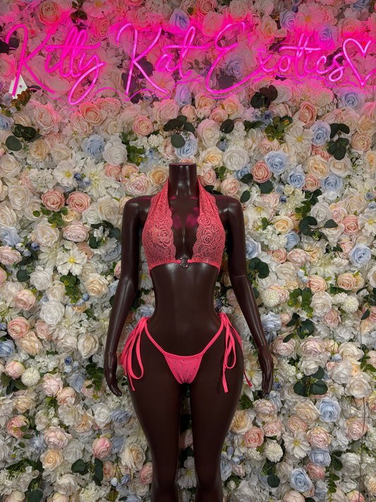 Hot pink lace bodysuit with open front, tie sides, and triangle thong bottom