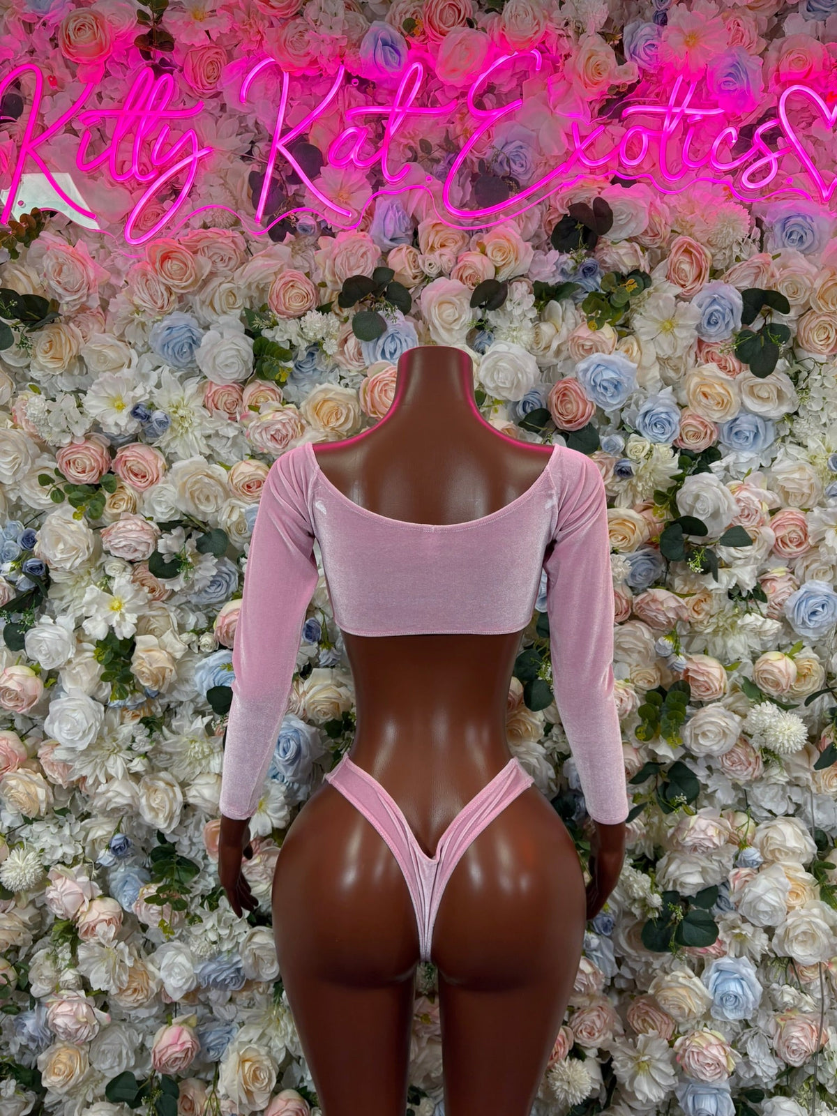 Girls pink long-sleeve crop top with draped neckline and high-cut bikini bottoms